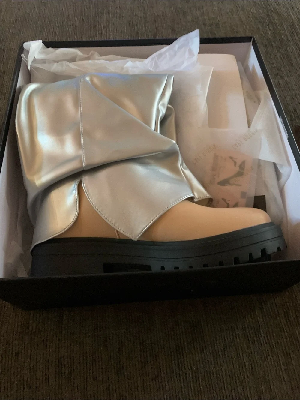 Cape Robbin striking metallic silver fold-over lug-sole boots feature a tan base